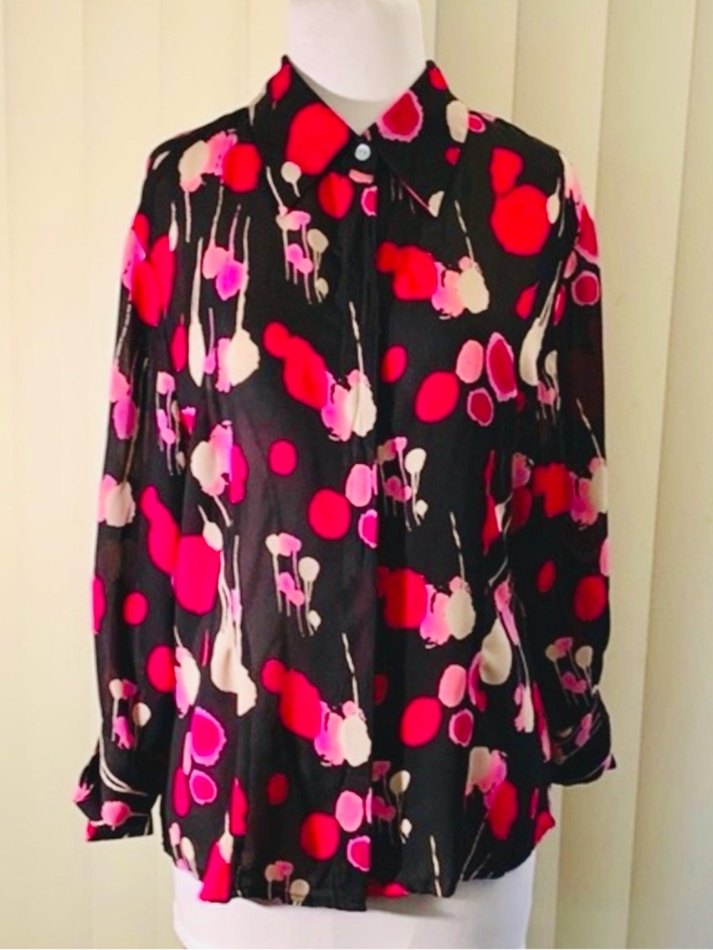 Violet & Claire shades of pink on black long sleeve blouse.